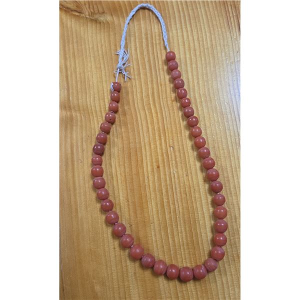 One 18” Strand of Antique Genuine Graduated Indonesian Orange Coral Beads