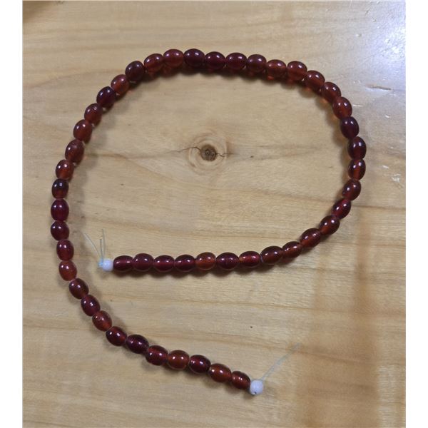 One 17” Antique Red Wound Beads