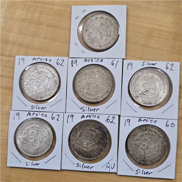 Seven Mexican Silver Pesos