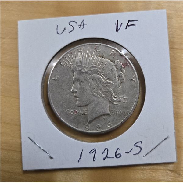 One 1926 American Silver Peace Dollar.