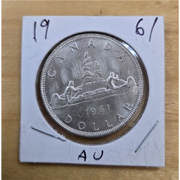 One 1961 Canadian Silver Dollar.