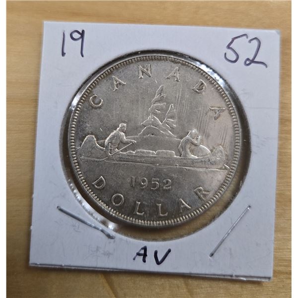 One 1952 Canadian Silver Dollar.