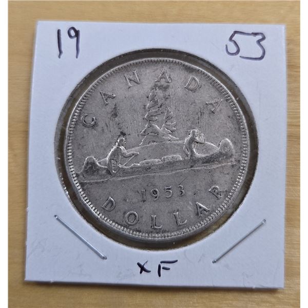 One 1953 Canadian Silver Dollar.