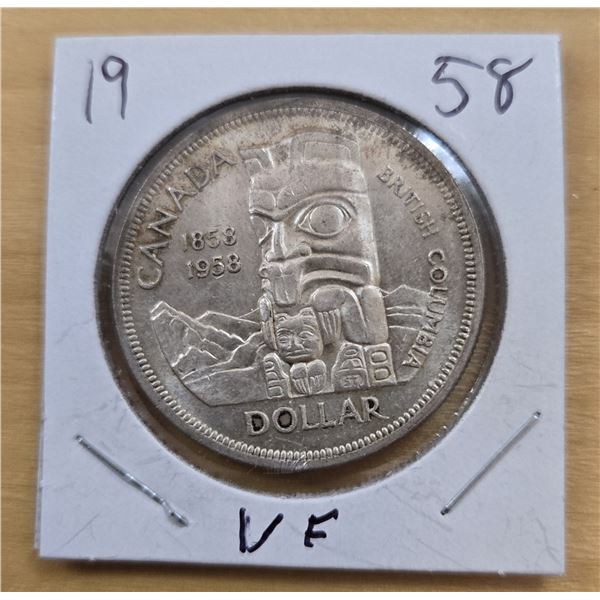 One 1958 Canadian “Totem” Silver Dollar.