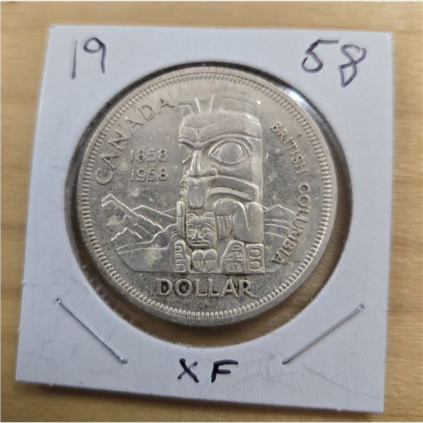 One 1958 Canadian “Totem” Silver Dollar.