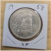 Image 1 : One 1958 Canadian “Totem” Silver Dollar.