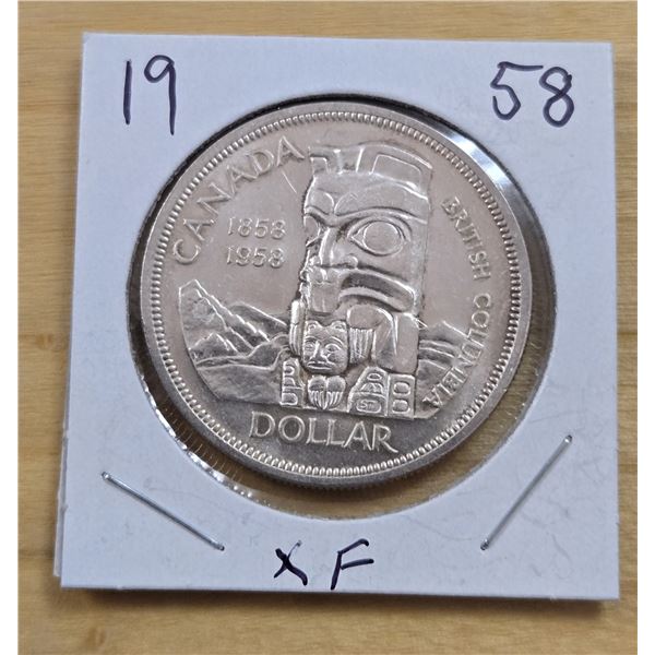 One 1958 Canadian “Totem” Silver Dollar.