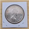 Image 2 : One 1957 Canadian Silver Dollar.