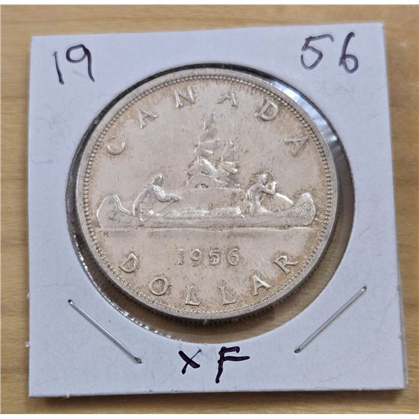 One 1956 Canadian Silver Dollar.