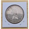 Image 2 : One 1956 Canadian Silver Dollar.