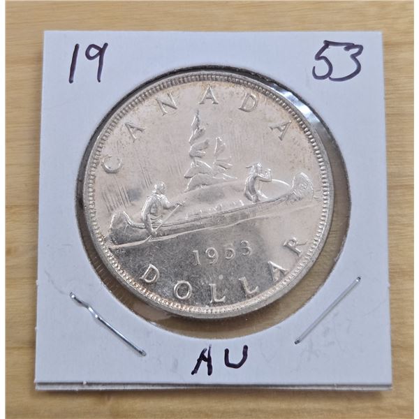One 1953 Canadian Silver Dollar.