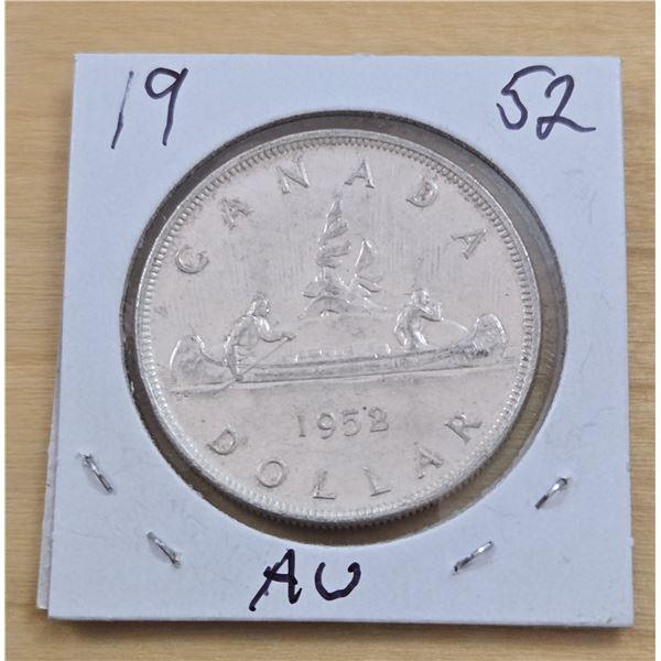 One 1952 Canadian Silver Dollar.