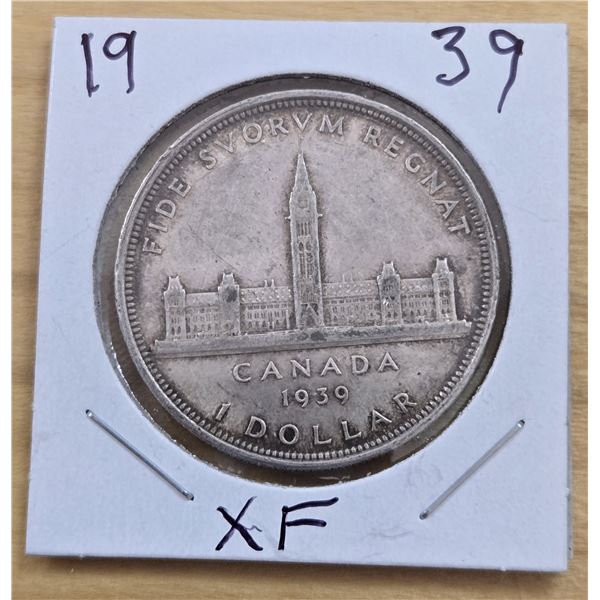 One 1939 Canadian Silver Dollar.