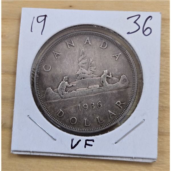 One 1936 Canadian Silver Dollar.