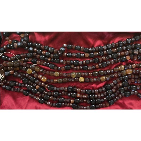 Four Assorted Strands of Light & Dark Amber