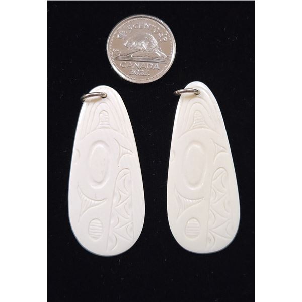Two Signed Pat Dixon Carved Horn Pendents