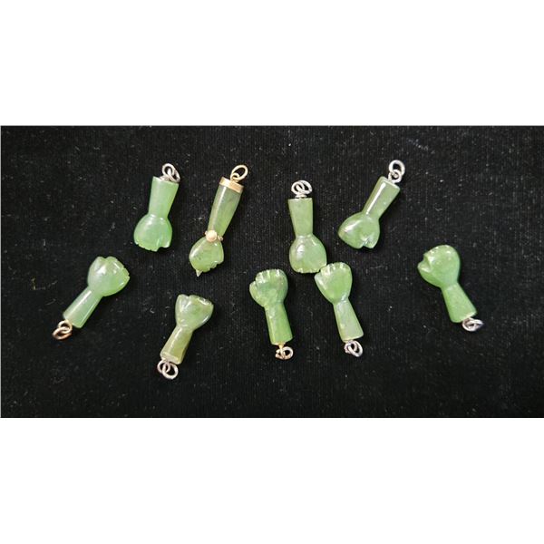 Nine Small Jade Fist Pendents