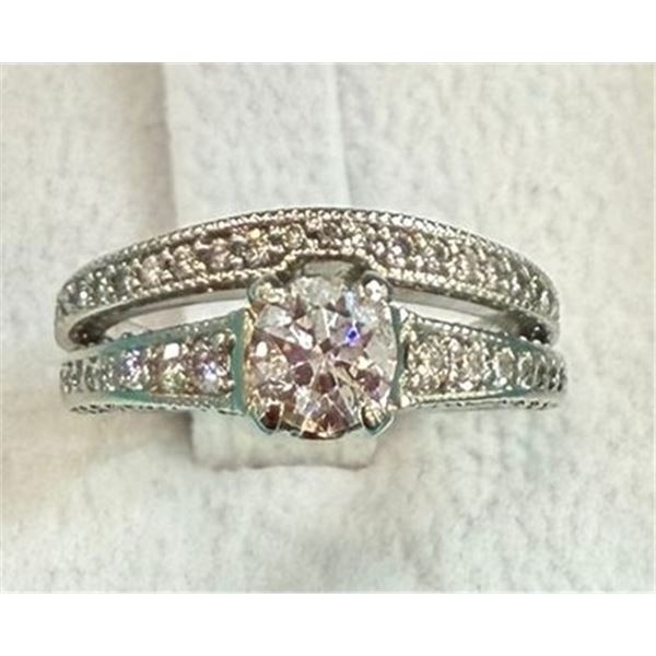 One Ladies 18 K White Gold and Diamond Wedding Ring Set