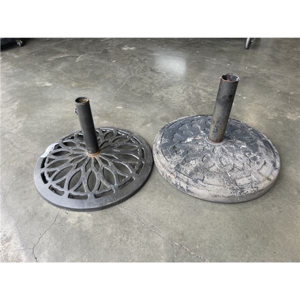 2 CAST IRON UMBRELLA STANDS