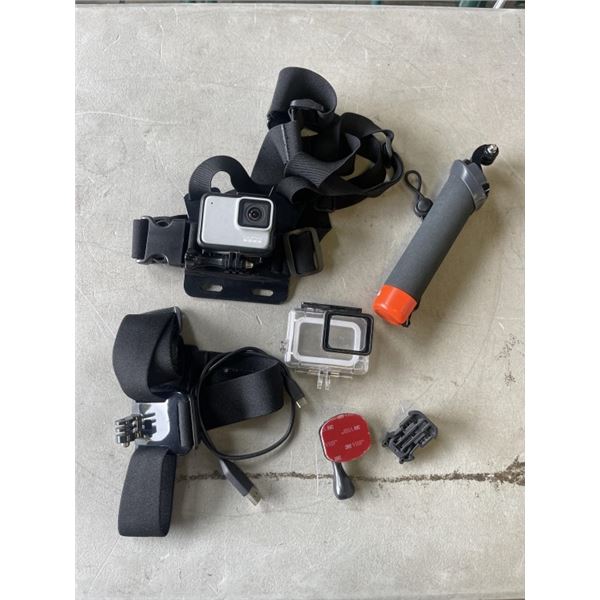 GOPRO W/ PROTECTIVE CASE AND ACCESSORIES