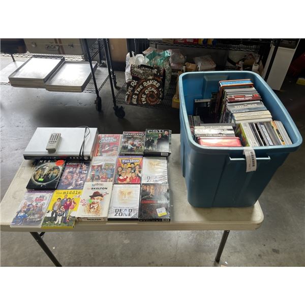 TOTE OF DVDS, AND DVD PLAYER WITH REMOTE