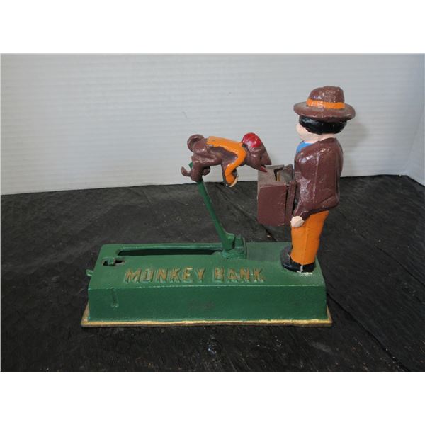 COLLECTABLE:  CAST IRON MONKEY BANK (APPROX. 7"L X 7"H)