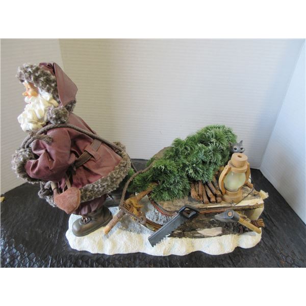 SANTA CLAUS CUTTING DOWN CHRISTMAS TREE ORNAMENT