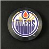 Image 1 : CONNOR MCDAVID SIGNED OILERS HOCKEY PUCK GCG HOLO