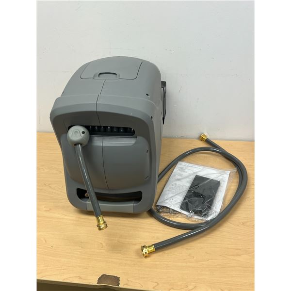 Garden Hose And Reel - see all photos for details