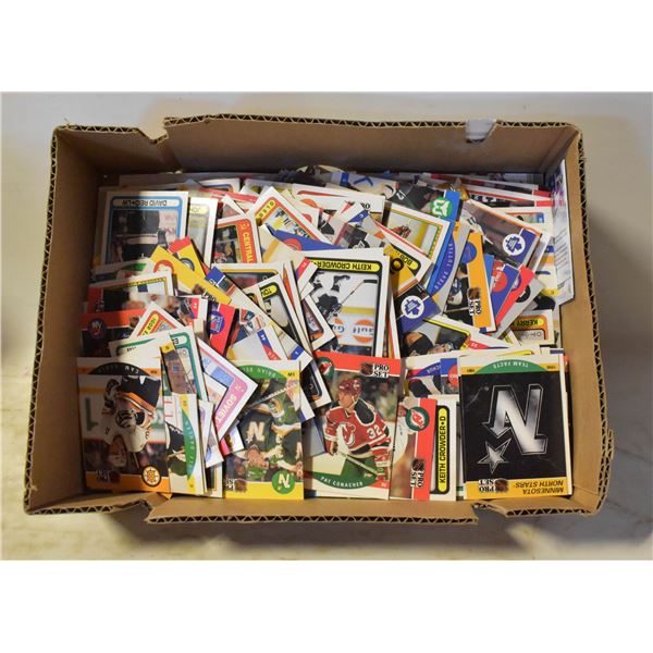 25)  BOX OF HUNDREDS OF HOCKEY TRADING