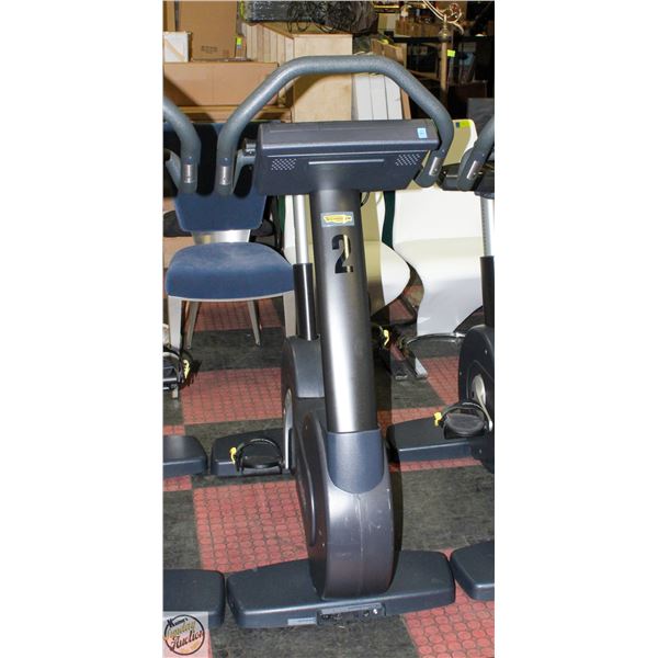 TECHNOGYM STATIONARY SPIN BIKE WITH 15.5" SCREEN
