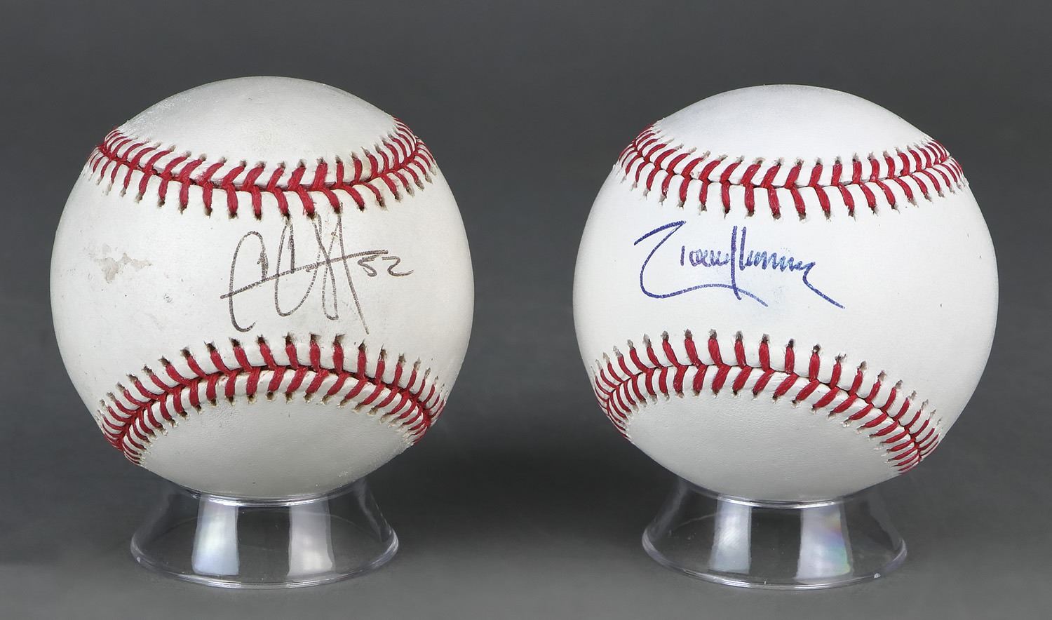 Pair Of Autographed Baseballs Signed by Randy Johnson & CC Sabathia,