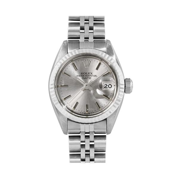 Rolex Ladies Stainless Steel 14K Fluted Bezel Date Watch