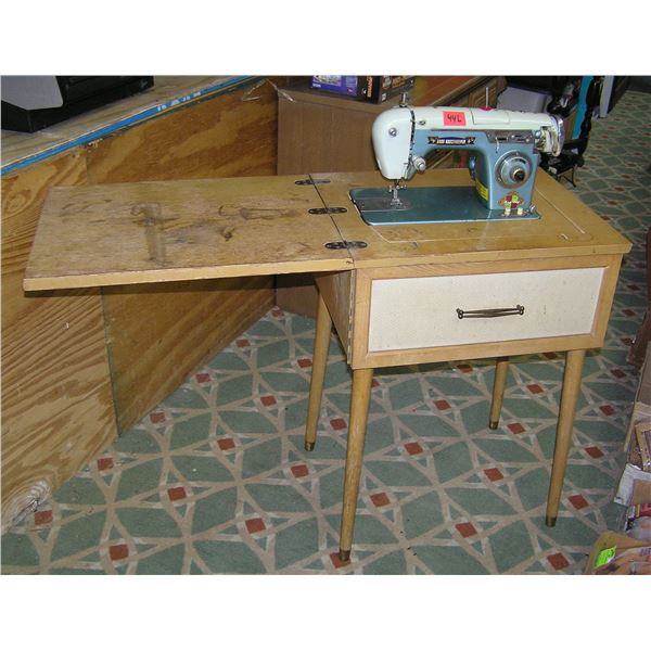 Zig Zag Deluxe sewing machine and cabinet