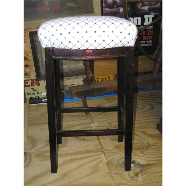 Padded and upholstered walnut bistro/bar stool