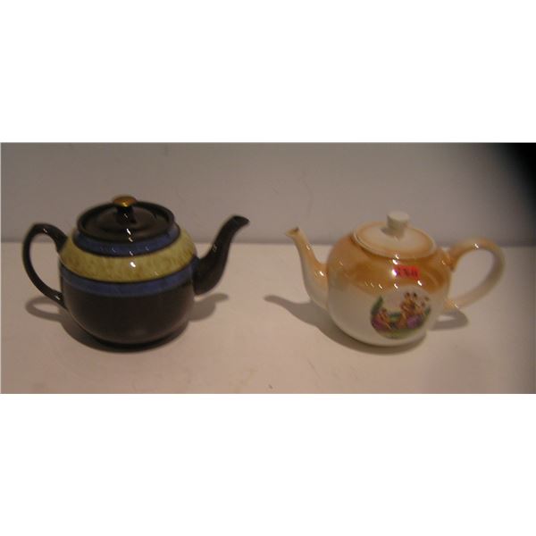 Pair of early tea pots by S. C. Richard