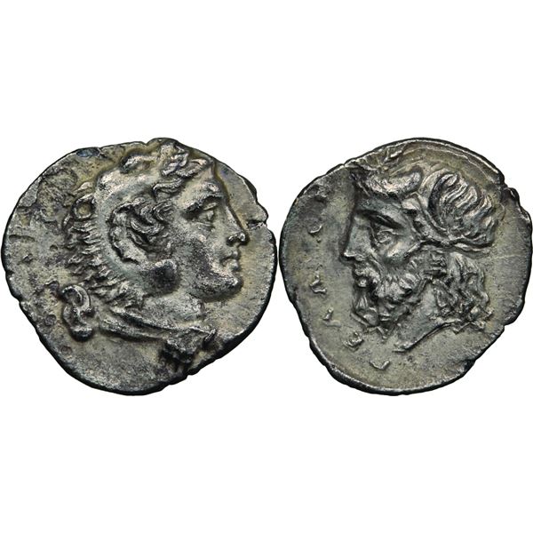 Gela Litra, vers 339-310 av. J.C., AG 0.65 g.  Avers : Tête d'Héraclès à droite, portant une coiffe 