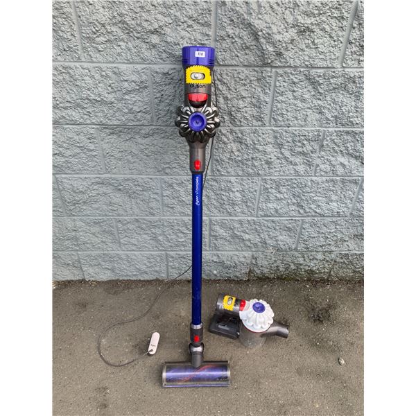 Lot of 2 Dyson Vacuums w/ 1 Charger - Model V7 - Purple one Works - As-Is Untested