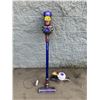Image 1 : Lot of 2 Dyson Vacuums w/ 1 Charger - Model V7 - Purple one Works - As-Is Untested
