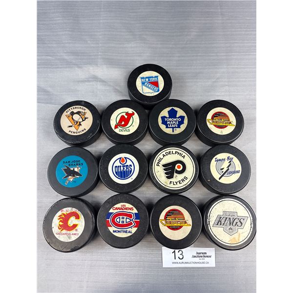 Lot of 12 Vintage NHL Hockey Pucks