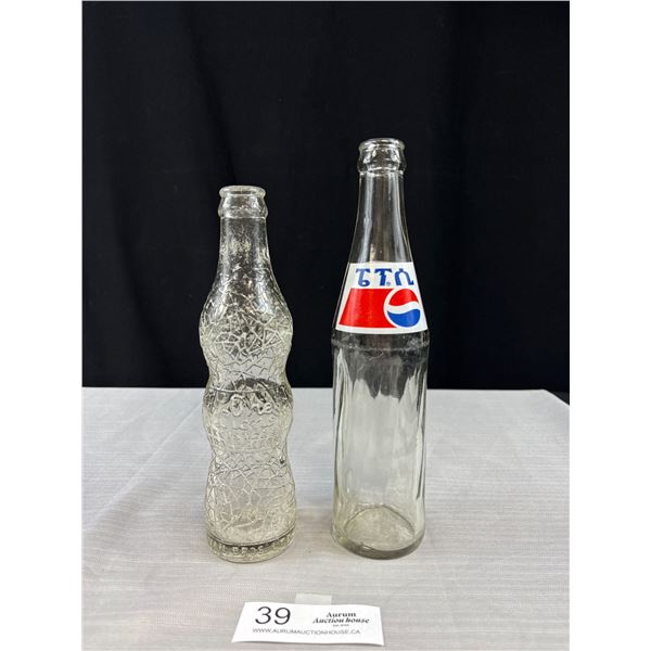 Vintage Vancouver Lions Soda Bottle and Vintage Foreign Pepsi Bottle