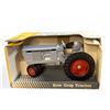 Image 1 : Vintage DieCast Surplus Tractor Parts Corp. Toy Tractor by The Toy Farmer - Red Wheels, Gray Body In
