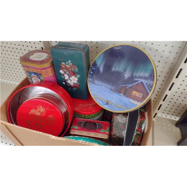 A Box Of Decorative Holiday Cookie and Sweets Tins