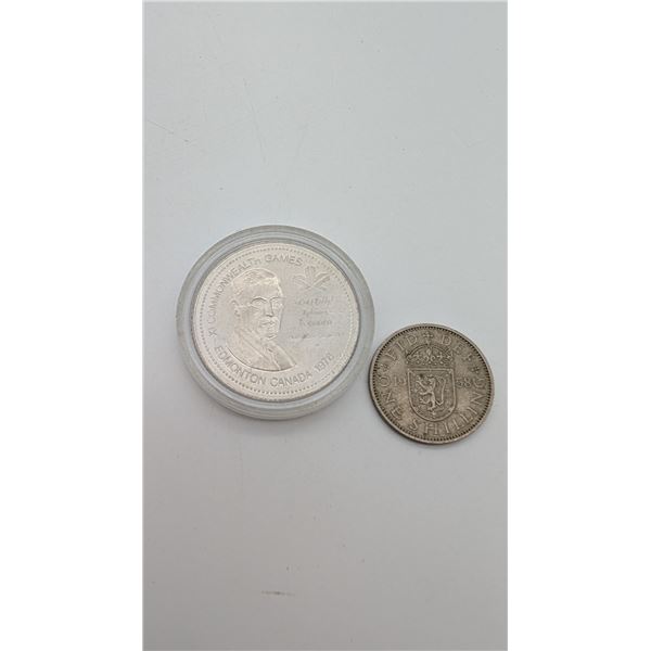 1980 Percy Williams token and 1958 1 shilling coin.