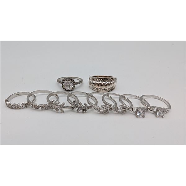 10 silver rings. all marked .925