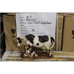 COW W/ CALF LYING DOWN