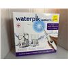 Image 1 : Waterpik water flosser with Ultra and Nano