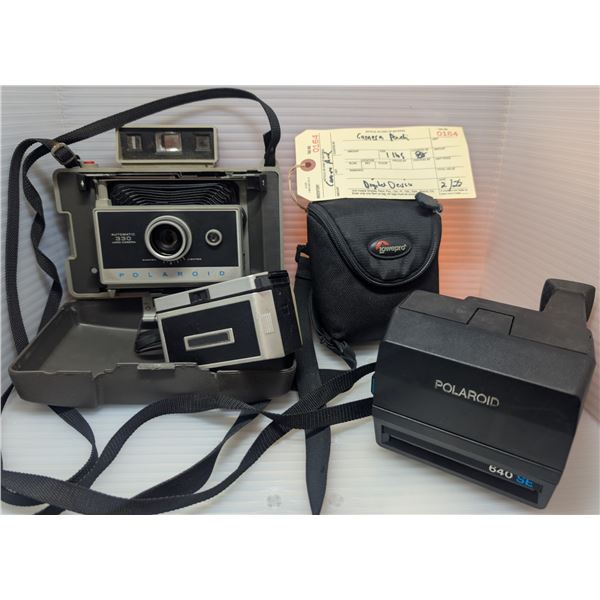 Group of vintage polaroid cameras