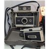 Image 2 : Group of vintage polaroid cameras