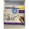 Image 1 : Waterpik water flosser with Ultra and Nano